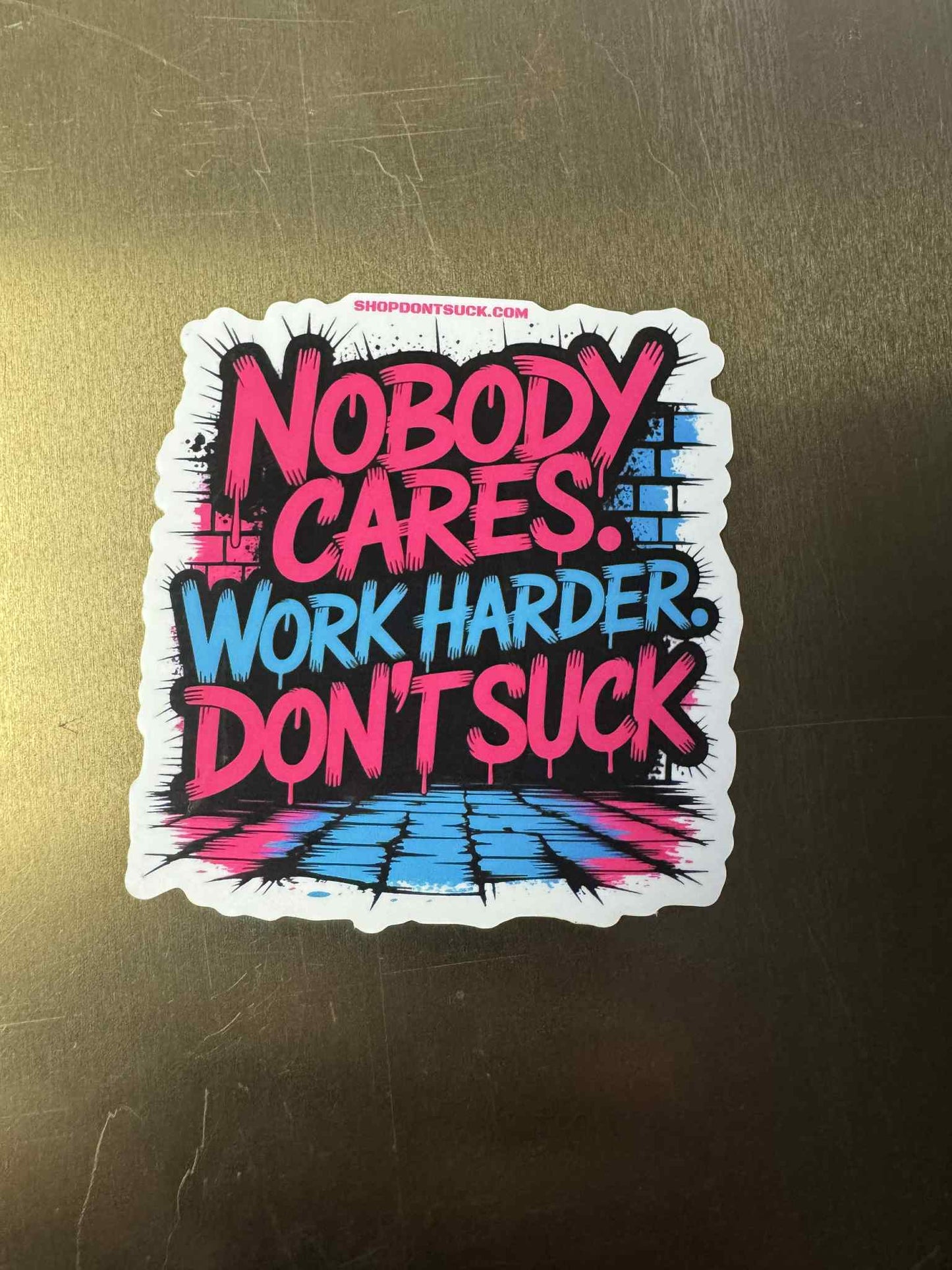 "Nobody Cares. Work Harder. Don't Suck" Graffiti Style Motivational Sticker – 3"